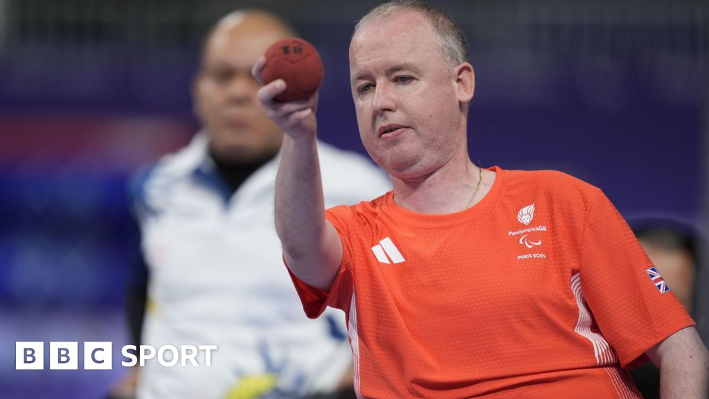 Stephen McGuire prepares to throw the boccia ball in his Paralympic Games final