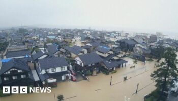 Japan orders mass evacuation over flooding threat