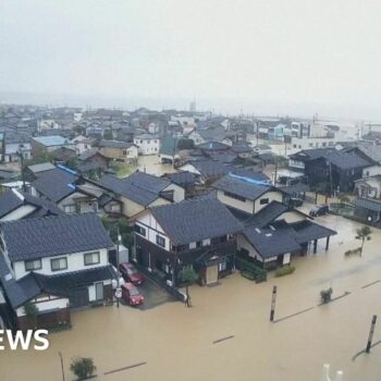 Japan orders mass evacuation over flooding threat