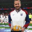 Harry Kane celebrates scoring on his England debut