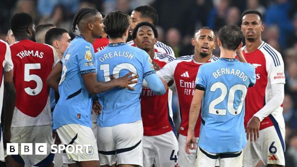 Arsenal and Manchester City players square up