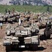 Middle East on the brink: Israeli tanks mass at the border with Lebanon amid fears of imminent ground invasion - as West scrambles to prevent 'all out war' following IDF airstrikes in Yemen