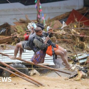 People 'jump from roof to roof' as floods kill 120 in Nepal