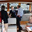 Princess Anne looks elegant in a navy blazer and bold sunglasses as she tours yachts at the Southampton Boat Show