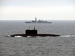 Royal Navy warship shadows Putin submarine in the English Channel as four Russian vessels enter UK waters amid increasing tensions over Ukraine and threat to 'sink' Britain