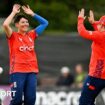 Issy Wong (left) and Hollie Armitage (right) celebrate a wicket for England against Ireland