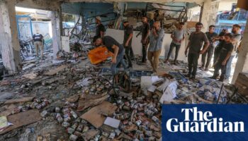 Six Unrwa workers among estimated 14 killed in Israeli strike on Gaza school sheltering displaced