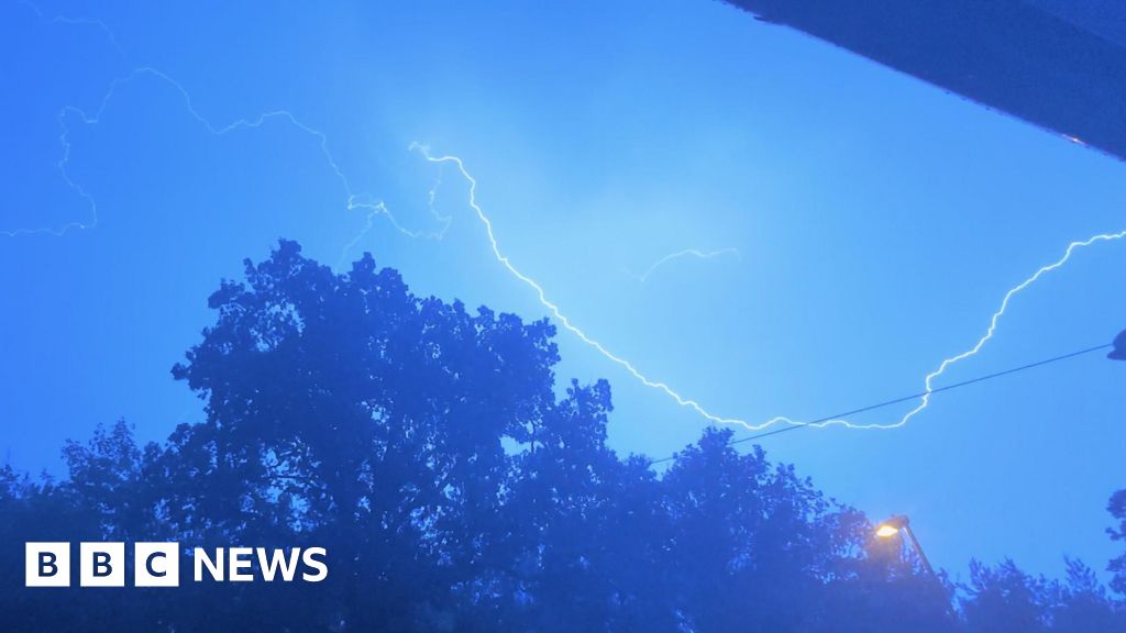 Thunderstorms and heavy rain sweep parts of UK