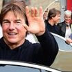 Tom Cruise enjoys a day out with his billionaire buddies as they touch down at Battersea in his chopper