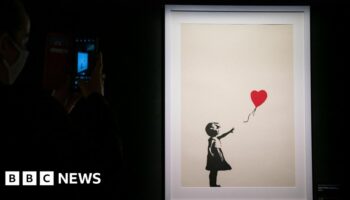 Two men charged over stolen Banksy artwork