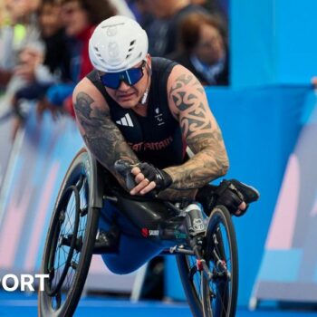 David Weir crosses the finish line in Paris