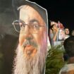 Des manifestants brandissent des portraits du chef du Hezbollah Hassan Nasrallah, le 28 septembre 2024 à Sidon, dans le sud du Liban