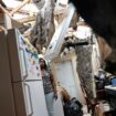 Natasha Ducre surveys the kitchen of her devastated home after the hurricane. Pic: AP