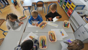 Pupils of the "Ecole des Reformes" (School of Reforms) take part in an after school activity in the framework of the reform of school timetables on October 11, 2013 in Nantes, western France.