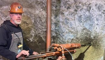 Patrick Weier working as a tour guide at the mine. Pic: AP