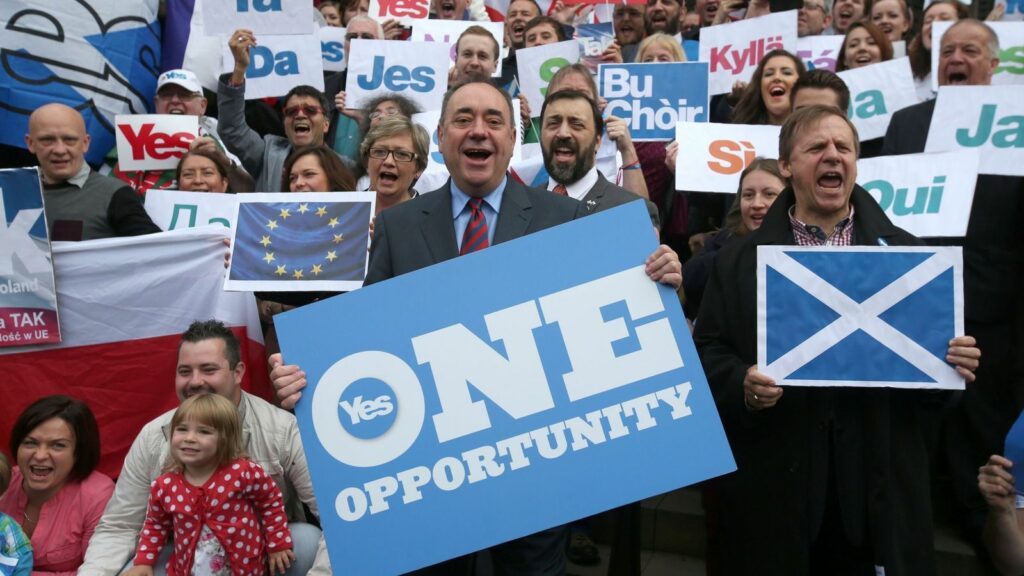 Scottish First Minister Alex Salmond campaigns or a yes vote with other Scots and supportive Europeans in Edinburgh in 2014. Pic: PA