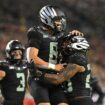 Oregon holds off Ohio State's final-second comeback in epic battle of top-three Big Ten programs