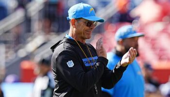 Chargers' Jim Harbaugh abruptly leaves game with mystery illness, returns minutes later