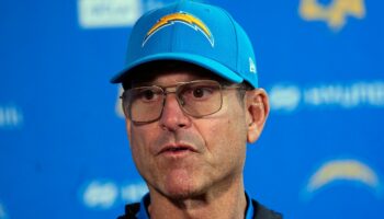 Chargers' Jim Harbaugh explains heart issue that led to his brief exit from game vs Broncos