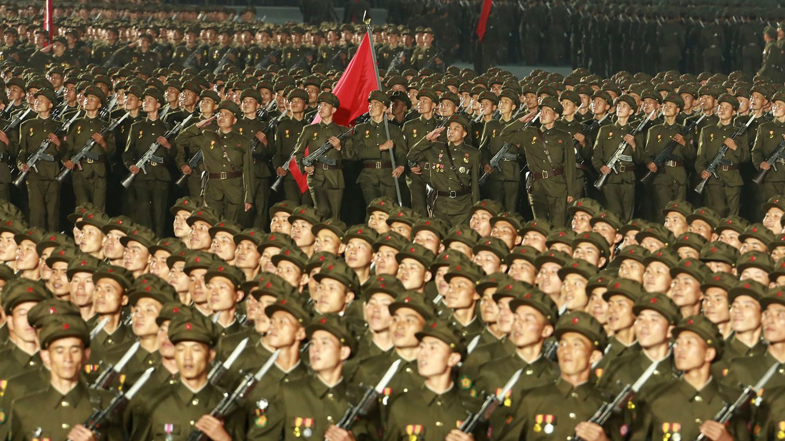 In this photo provided by the North Korean government, North Korean solders parade during a celebration of the nation’s 73rd anniversary that was overseen by leader Kim Jong Un, at Kim Il Sung Square in Pyongyang, North Korea, early Thursday, Sept. 9, 2021. Independent journalists were not given access to cover the event depicted in this image distributed by the North Korean government. The content of this image is as provided and cannot be independently verified. Korean language watermark on im