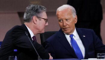 U.S. President Joe Biden looks at Britain's Prime Minister Keir Starmer at a meeting of the North Atlantic Council at the level of Heads of State and Government, Indo-Pacific and European Union during NATO's 75th anniversary summit in Washington, U.S., July 11, 2024. REUTERSLeah Millis