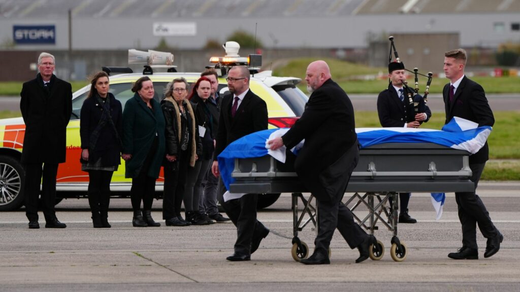 Alex Salmond's body is repatriated to the UK, watched by members of his family and acting Alba Party leader Kenny MacAskill. Pic: PA