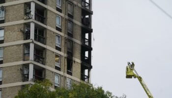 Emergency services at the scene of a fire at a residential block on Queens Road West, Plaistow, London. Picture date: Monday October 21, 2024.