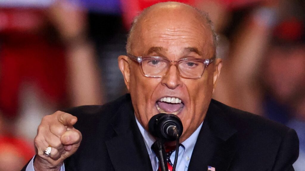 FILE PHOTO: Former mayor of New York City and former Trump lawyer Rudy Giuliani speaks at the Nassau Veterans Memorial Coliseum during a rally held by Republican presidential nominees and former U.S. President Donald Trump, in Uniondale, New York, U.S., September 18, 2024. REUTERS/Brendan McDermid/File Photo