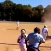 Virginia softball player contends with dust devil as she makes diving play for out