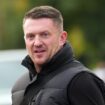 Tommy Robinson charged with terror offence after failing to provide phone password