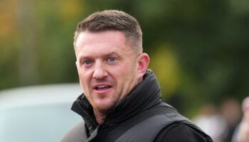 Tommy Robinson charged with terror offence after failing to provide phone password