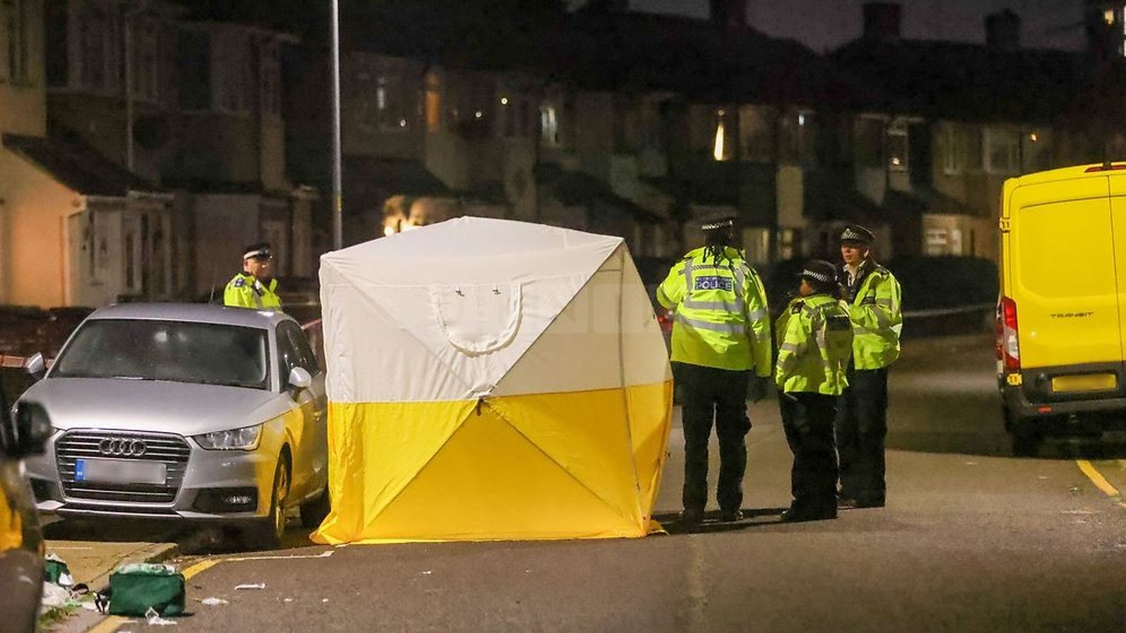 A crime scene tent erected in First Avenue, Dagenham, after a woman and two girls were stabbed. Pic: UKNIP