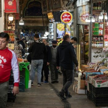 People go about their daily lives after the Israeli retaliatory strike in Iran. The airstrike has left many of the country's inhabitants undaunted. Pic: AP