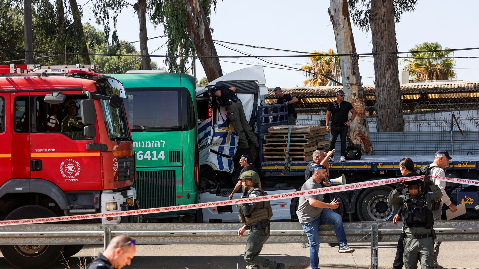 One killed and more than 30 injured as truck rams into bus stop near Tel Aviv