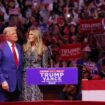 Republican presidential nominee and former U.S. President Donald Trump embraces Melania Trump during a rally at Madison Square Garden, in New York, U.S., October 27, 2024. REUTERS/Andrew Kelly