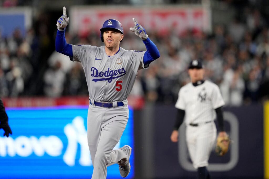 Los Angeles Dodgers hang on late to clinch third win of World Series