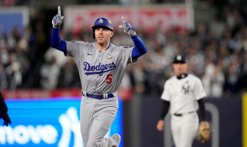 Los Angeles Dodgers hang on late to clinch third win of World Series