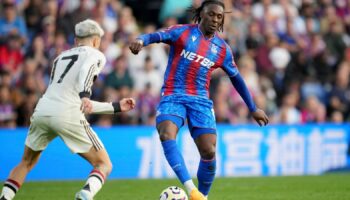 Crystal Palace's Eberechi Eze controls the ball in front of Manchester United's Alejandro Garnacho, left, during the English Premier League soccer match between Crystal Palace and Manchester United at Selhurst Park in London, Saturday, Sept. 21, 2023. (AP Photo/Kin Cheung)