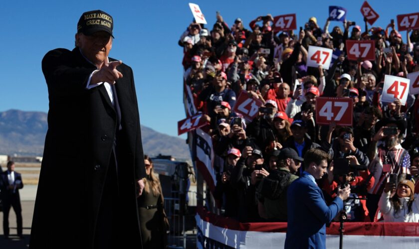 Trump makes play for blue-leaning state as he briefly detours from the battlegrounds