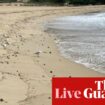 Australia news live: Sydney beach closed after mysterious black balls wash ashore; Penny Wong launches humanitarian policy