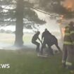 Bodycam captures rescue of woman in basement of burning house