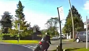 Car passenger flung to ground 'by motorcyclist in road rage hit-and-run attack'