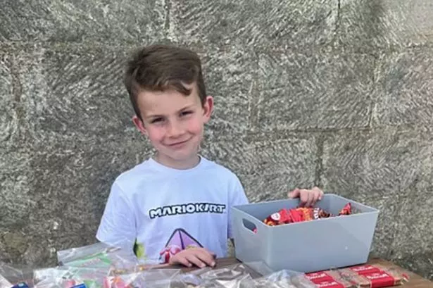 Cheeky little boy delighted at reaction to his eight-word Halloween note