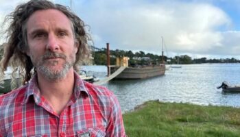 Dad facing two years in prison for mooring boat on his own land