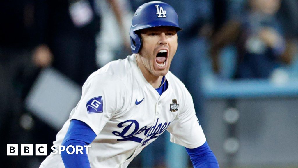 Los Angeles Dodgers first baseman Freddie Freeman celebrates after hitting a walk-off grand slam to win game one of the World Series