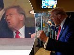 Donald Trump waves to adoring NFL fans chanting 'USA' after arriving at Jets-Steelers game