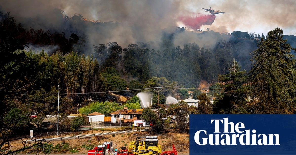 Hundreds evacuated in Oakland after California brush fire grows out of control