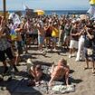 Hundreds of anti-tourist protesters storm Tenerife beach as holidaymakers cower in their towels