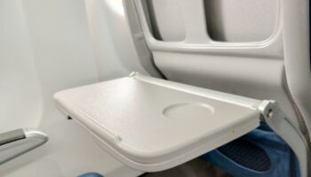 'I'm a flight attendant and this is why you should always avoid eating off tray tables on planes'