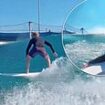 Moment Prince Harry launches into the waves to show off impressive surfing skills at California surf ranch four years after Meghan bought him lessons